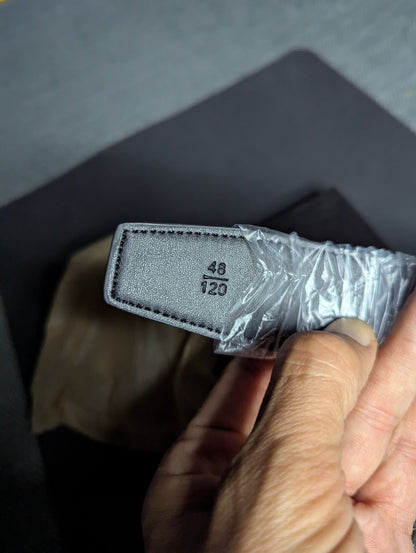 Amiri Belt gold and black logo